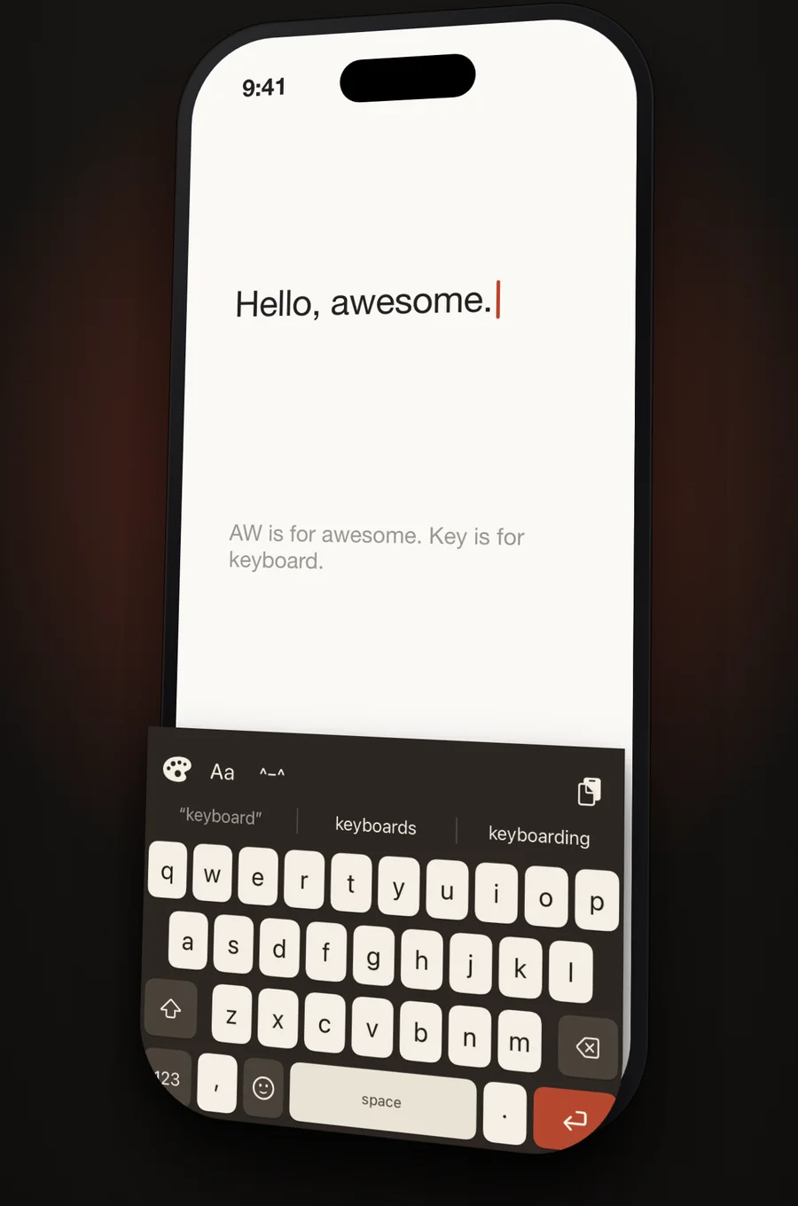 An iPhone showing the AWKey keyboard with a classic typewriter theme