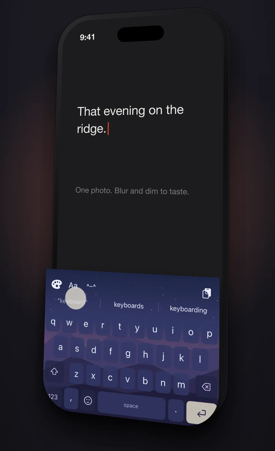 An AWKey keyboard with a personal photo blurred and dimmed behind the keys